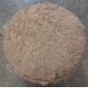 Pouf rotondo contenitore  rivestito in finta pelliccia a pelo lungo  usato